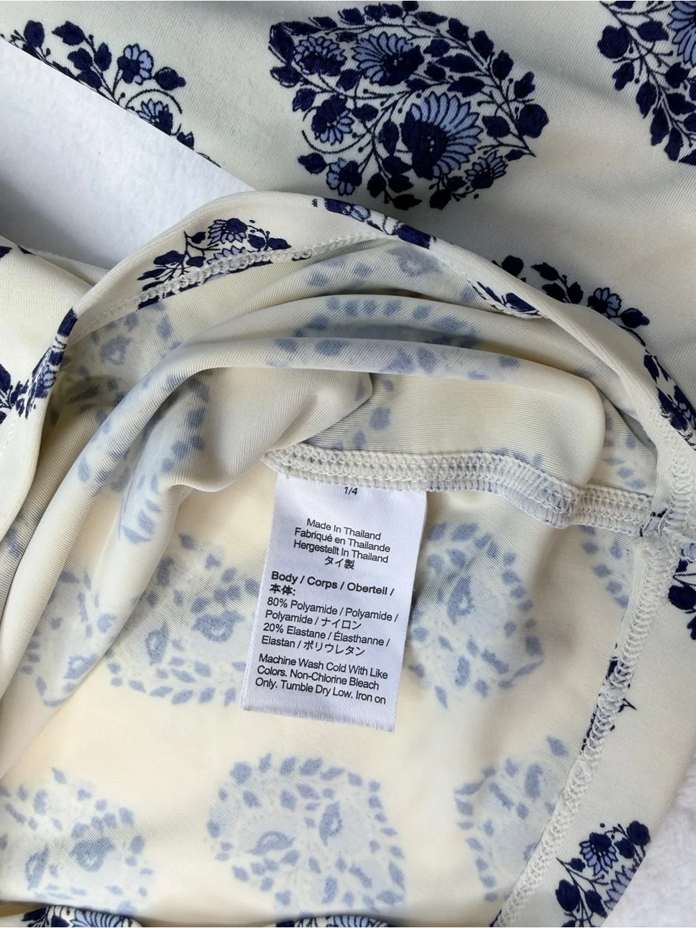 J.Crew long-sleeve rash guard featuring an all-over navy and white floral 6-7